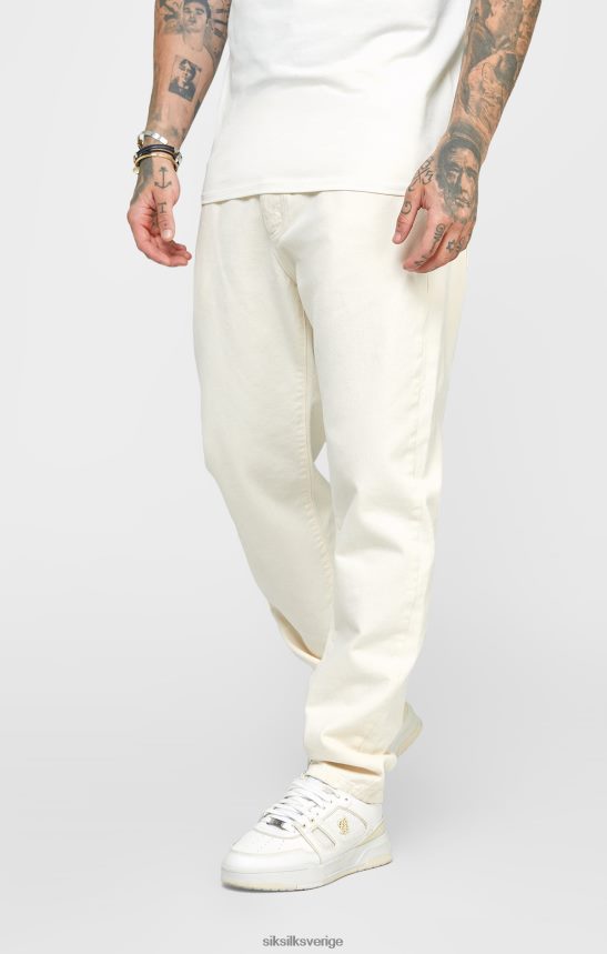 män SikSilk ecru jeans med avslappnad passform kläder 02V424545